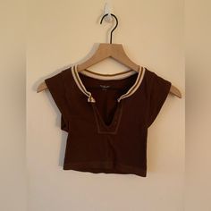 Super Flattering And Comfortable. I’m Not The Biggest Fan Of This Color On Me But Love The Fit. I’ve Never Worn It Because Of That Reason. Brown Cotton Crop Top, Brown Cotton Y2k Top, Sporty Cotton V-neck Crop Top, Sporty Brown Tops For Spring, Sporty Brown Top For Spring, Brown Cotton Crop Top For Day Out, Trendy V-neck Tops From Urban Outfitters, Urban Outfitters Vintage Cotton Top, Urban Outfitters Fitted Vintage Top