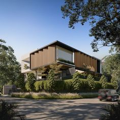 an artist's rendering of a modern house in the middle of trees and bushes