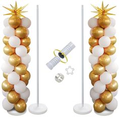 two tall white and gold balloon columns