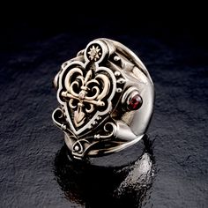 "Sterling Silver And Diamond Large Chunky Ring, With Garnet Stones Decoration, Unique Statement Jewelry For Men I call this ring \"kings ring\" This decorative ring is a break from the traditional classic die-stamped Dexter ring.  This fine example is crafted in 9k yellow gold with precision and traditional techniques within the handmade ring, garnets stones, and Diamonds. This ring is a true concept piece of art, a - Royal Ring. I design all parts of the ring to integrate homogeneously. I creat Knight Ring, Leather Silver Bracelet, Etsy Crystals, Ring Armor, Garnet Stone Ring, Byzantine Rings, Royal Rings, King Ring, Armor Ring