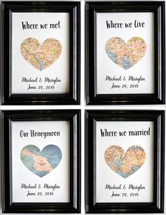 four framed maps with hearts and names in black frames on a white wall behind them