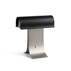 a black and silver mailbox holder on a white background