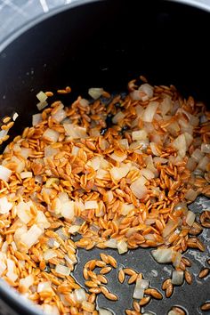 some food is being cooked in a pan