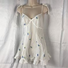 Vintage Y2k Victoria’s Secret Cotton Corset Back Slip Dress Condition Is Excellent Pricing Is Adjusted For The Rarity Of The Piece, And Condition. This Is Extremely Rare And Hard To Find Piece From Victoria’s Secret. Flounce Hem Fitted Darts Adjustable Straps Flirty Lace Up Corset Back Embroidered Satin Flowers In A Light Blue/ Lavender/Green Straps Have Ties For Accents On Shoulders Tiny Eyelet Lace Edges Size Is S 100% Lightweight Cotton This Cottagecore Slip Dress Is So Adorably Cute! Use As Corset Slip Dress, Lace Up Corset Back, Cotton Corset, Lace Edges, Lace Up Corset, Lavender Green, Corset Back, Blue Lavender, Cottagecore Dress