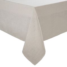 a white table cloth on top of a wooden table