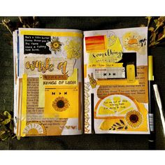 an open book with sunflowers and writing on it