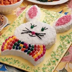 a cake shaped like a bunny is on a table