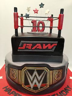 a birthday cake made to look like a wrestling ring