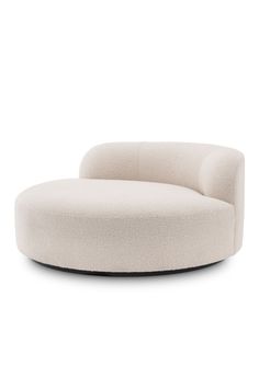 a white circular chair with black legs