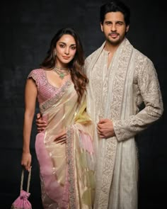 About this item: Celebrity Style Kiara Advani Mam's inspired very premium tissue silk saree with rich pallu- Saree with a classy design and beautiful premium blouse  Saree: Soft Tissue Silk  Blouse: Soft Golden Zari blouse  Fabric: Tissue Silk  Washing instructions: Dry Wash only Note: 5% colours may vary slightly due to lighting. If you are interested in purchasing this item and have any questions about this item please feel free to send a message Shipping: Ready to ship 1-2 business day. We sh Tissue Silk Saree, Sidharth Malhotra, Desi Fashion Casual, Saree Design, Couple Picture Poses, Couple Photoshoot Poses, Kiara Advani, Photo Poses For Couples, Couple Photography Poses