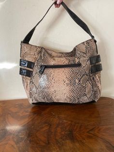 "Style and Co, Faux Leather Purse ,Snake skin fabric print, black, Tan, Shoulder Bag, Non Leather Beautiful soft fabric roomy purse Zip closures Lined w/1 zip pocket and 2 slip pockets PLEASE SEE MEASUREMENTS Measures: 15\" x 12\" x 5\" Strap: drop 8\" Excellent condition NK901DN Style and Co, Faux Leather Purse ,Snake skin fabric print, black, Tan, Shoulder Bag, Non Leather" Leather Tote Bag With Snake Print, Chic Leather Shoulder Bag With Snake Print, Chic Snake Print Shoulder Bag For Everyday Use, Snake Print Leather Tote Shoulder Bag, Leather Snake Print Tote Shoulder Bag, Leather Snake Print Satchel Bag, Leather Snake Print Satchel Shoulder Bag, Leather Tote Shoulder Bag With Snake Print, Leather Satchel Shoulder Bag With Snake Print