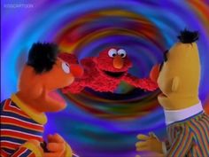 the muppets are talking to each other in front of a colorful swirl background