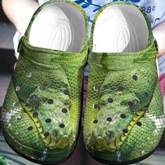 Get your product: Snake Crocs Classic Clogs Shoes
1. PRODUCT INFORMATION:

Incredibly light and fun to wear.
Water-friendly and buoyant; weighs only ounces.
Ventilation ports add breathability and help shed water and debris.
Easy to clean and quick to dry.
Upper: Croslite.
Lining: Croslite.
Sole: Croslite.
2. SIZE CHART:
3. RETURN:
We will gladly issue you a replacement item or issue a refund back to your original form of payment for any of the following reasons:
You receive an incorrect item
Yo Outdoor Non-slip Slip-on Clogs, Casual Green Sports Clogs, Non-slip Synthetic Closed Toe Clogs, Synthetic Round Toe Clogs For Sports, Green Synthetic Beach Clogs, Green Synthetic Clogs For Beach, Non-slip Synthetic Slide Clogs, Breathable Slip-on Clogs For Outdoor Activities, Green Closed Toe Clogs For Outdoor Activities