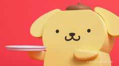 a yellow dog holding a white frisbee in it's mouth on a pink background