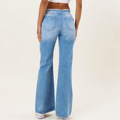 Low rise, non-stretch denim Rigid texture with frayed waistband detail 100% Cotton Size and Fit: Model height 5’8” wearing size 25 Runs small, consider sizing up Boot Cut Denim, Model Height, Stretch Denim, Low Rise, Running, Texture, How To Wear