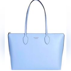 Kate Spade New York, The Silver Hardware Bleecker Large Zip Top Tote Bag Features: Saffiano Lined Silver Hardware Zipper Closure Interior: Zip Pocket Approx.: 13.5" X 14.8" X 5.1"; Strap: 11" Luxury Light Blue Office Bag, Chic Light Blue Formal Bag, Designer Light Blue Formal Bags, Elegant Light Blue Top Handle Bag, Elegant Blue Shoulder Bag For Everyday Use, Elegant Light Blue Bag For Daily Use, Blue Saffiano Leather Top Handle Bag, Classic Blue Saffiano Leather Bag, Blue Saffiano Leather Bag For Everyday Use