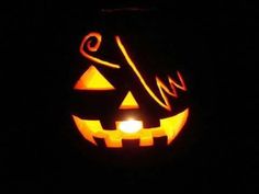 a carved jack o lantern in the dark