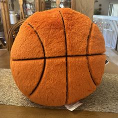 an orange basketball sitting on top of a counter