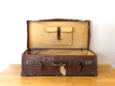 Antique Suitcase, Travel Luggage, Leather Train Case, Leather Valise, Suitcase Table An Antique (1920-30) travel suitcase,covered with genuine leather.. The suitcase is in Fair Antique condition (used) with a lot of spots upon metal and leather parts. The interion part is in Fair Antique Condition too. Only for Decorative purposes...its an antique suitcase... Please check all photos.. Leather Suitcase Dimensions: Base : 88 x 45 cm or 34.64 x 17.71 inches Height: 26.5 cm or 10.43 inches Weights a Brown Rectangular Travel Case, Brown Bags With Luggage Sleeve For Storage, Brown Rectangular Travel Bag, Brown Cases With Luggage Sleeve For Trip, Vintage Rectangular Luggage For Overnight Trips, Vintage Brown Luggage For Trips, Rectangular Brown Cases For Trip, Brown Rectangular Cases For Trip, Brown Rectangular Cases For Trips