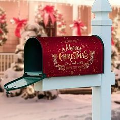 a red mailbox with merry christmas written on it