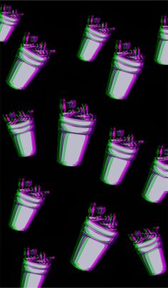 several buckets filled with lots of different colored objects in the middle of black background