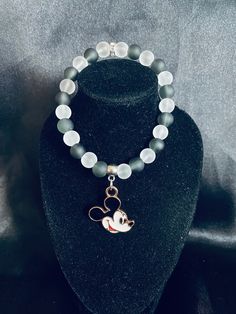 Handmade Mickey Mouse Stretch Charm Bracelet. Customizing available Message for more detail. Personalized Bracelets, Colorado Springs, May 1, Charm Bracelets, Springs, Jewelry Bracelets, Colorado, Etsy Accessories, Handmade Items