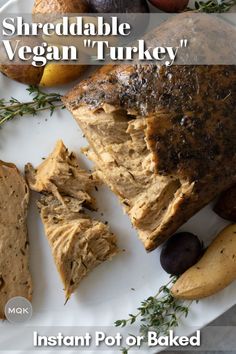 there is a plate with bread, fruit and crackers on it that says shredtablee vegan turkey instant pot for baked