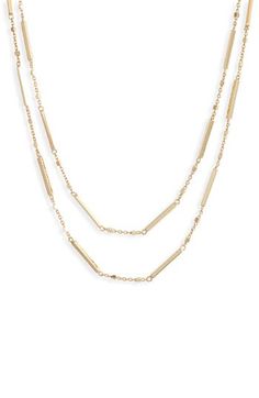 The 18-karat-gold plate brings shimmering light to this double-chain necklace that complements both casual and elevated looks. 14" shortest length; 16" longest length 18k-gold plate Imported Latinx Owned/Founded Gold Multi-strand Satellite Chain Necklace, Yellow Gold Necklace With Double Chain And Rectangular Links, Gold Double Strand Necklace With Double Chain, Double Strand Layered Necklace In Yellow Gold, Double Strand Yellow Gold Layered Necklace, Gold Double Strand Layered Necklace For Formal Occasions, Gold-tone Double Strand Gold Plated Necklace, Gold Plated Double Strand Chain Necklace, Gold Double Strand Layered Necklace