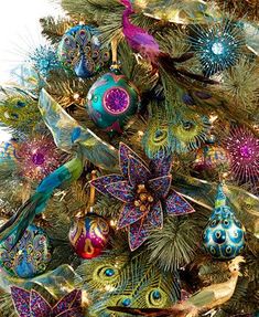 a decorated christmas tree with peacocks and ornaments