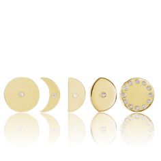 Experience the celestial beauty of the moon with our stunning Moon Phase Earrings. These delicate earrings elegantly depict the various lunar phases, adding a touch of mystique and charm to your style. Crafted with care and attention to detail, they are the perfect accessory for celestial enthusiasts and lovers of all things magical. Item Details Material: Solid 14k Gold Size: 8mm Gemstone: Lab-Grown Diamond VS/E Total Carat Weight: .0025-.05ct Post Back Sold as a Single or Pair. Our 14k solid g Elegant Yellow Gold Moon Phase Earrings, Elegant Moon Shaped Earrings With Sun And Moon Design, Gold Moon Phase Round Earrings, Celestial Half Moon Earrings With Moon Phase Detail, Celestial Crescent 14k Gold Earrings, Celestial Half Moon Phase Earrings, Celestial Moon Phase Moon Earrings, 14k Gold Celestial Round Earrings, 14k Gold Round Celestial Earrings