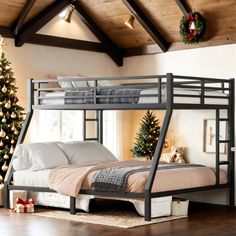 a bunk bed in a room decorated for christmas