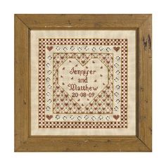 a framed cross stitch pattern with the words,'semfer and mathew 2010 - 2009