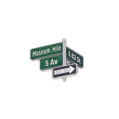 three street signs pointing in different directions on a white background with the words museum mile and east 5 av