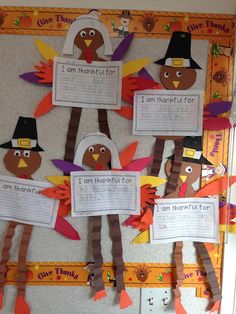 thanksgiving bulletin board with turkeys and paper cutouts on the front, i am thankful for