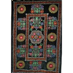 A beautiful hand-stitched Suzani Embroidery from Uzbekistan in Central Asia. This wonderful Suzani Embroidery would be a great piece as a bed cover, table-cover, or as a wall art.  Dimensions: 4’ 4” x 5' 11" Date of Manufacture: 2nd Quarter of the 1900s Place of Origin: Uzbekistan Material: Silk stitching embroidery on a fine velvet Condition: Wear consistent with age and use Suzani Embroidery, Stitching Embroidery, Central Asia, Bed Cover, Table Cover, 1950s Vintage, Vintage Silk, Table Covers, Bed Covers