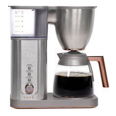 a coffee maker with a glass carafe on top