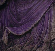 an image of purple curtains with laces on the top and bottom, as if they were drapes