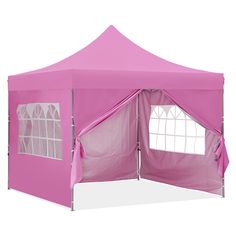 a pink tent with four windows on the side