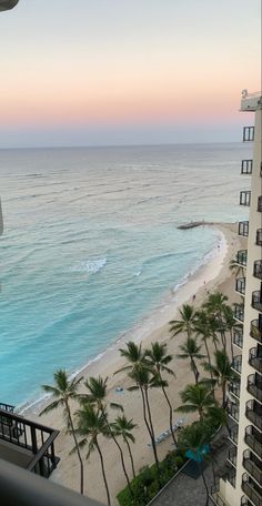 an ocean view from the balcony of a high rise apartment building in miami, florida