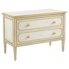 a white and gold dresser with two drawers