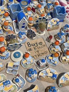 blue and white ceramic items on display at an outdoor market