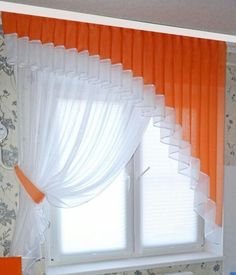 an orange and white bedroom with floral wallpaper on the walls, bedding and curtains