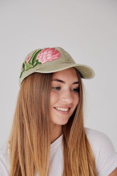 Hand embroidered baseball cap with protea Color: khaki baseball cap; Design: hand-embroidered protea with wildflowers; Capsize (head circumference): 55 - 67 cm; Fabric: 100% cotton Twill, garment-washed. The quality of the embroidery and baseball hat is superior, I guarantee! ;) I really enjoyed making this, and I hope my customer will enjoy showing it off. 🌿PLEASE NOTE THIS HAT IS READY TO SHIP🌿 CHECK OUR OTHER ACCESSORIES 🌸 More Baseball hats: https://www.etsy.com/shop/KazkovaEmbroidery?ref Spring Khaki Cotton Baseball Cap, Khaki Visor Baseball Cap For Spring, Spring Embroidered Adjustable Baseball Cap, Floral Embroidered Cotton Baseball Cap, Floral Embroidery Baseball Cap, One Size Fits Most, Embroidered Pink Baseball Cap, Embroidered Flower Baseball Cap, One Size, Kids Baseball, Embroidered Baseball Caps