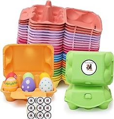 an assortment of plastic toys including eggs and cups