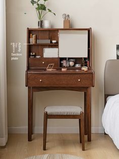 a wooden desk with a mirror, stool and shelf above it in a bedroom next to a bed