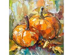 a painting of two orange pumpkins on a table