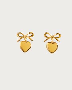 Gold Ribbon Heart Earrings | En Route Jewelry Yellow Gold Heart Earrings For Valentine's Day Party, Heart-shaped Bow Jewelry Gift, Heart Shaped Jewelry With Bow For Gift, Heart-shaped Earrings With Bow For Gift, Heart Shaped Bow Jewelry For Gift, Heart-shaped Anniversary Jewelry With Bow, Elegant Bow Heart Earrings For Party, Party Heart Earrings With Bow, Heart Shaped Bow Jewelry For Party