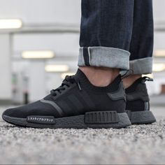 The Adidas Nmd R1 Is Back In All-Black. Nicknamed The "Triple Black" Edition, This Pair Is A Part Of The "Japan Boost" Pack. Sporting A Primeknit Upper, Boost Cushioning And A Black Sole With "The Brand With The Three Stripes" Written In Japanese On The Eva Insert Overlay On The Midsole As Well As On The Back Heel Pull Tab. Their Release Date Was August 11th, 2017 Where They Retailed For $170 In Men's Sizing. Another Perfect Adidas Nmd R1 For Everyday Wear. You Can Never Go Wrong With A Fresh All-Black Nmd In Your Rotation. Worn Once Black Fade-resistant Running Shoes, Adidas Nmd Black, Black Nmd, Fade-resistant Black Nylon Sneakers, Adidas Nmd R1 All Black, Adidas Nmd_r1, Adidas Nmd R1, Nmd R1, Triple Black