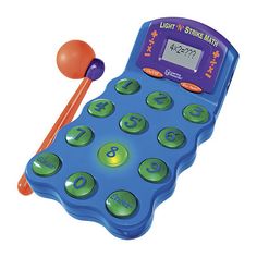 an electronic toy with numbers on it and a ball in the air next to it