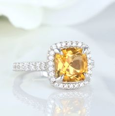 Gorgeous Cushion Cut Natural Citrine Ring ►Made of solid sterling silver with rhodium finish (925). ►Accented With Simulated Diamonds (CZ). ►Average band width: 1.9 mm. Center Stone: Citrine Color: Yellow Shape:Cushion Size: 8.0 x 8.0 mm Carat Weight: 2.5 ct. (approx.) Gemstone creation: 100% Natural Hardness: 7 (Mohs scale) ✓ 100% Nickel-Free ✓ Hypoallergenic ✓ Comfort Fit ✓ Free Ring Box ✓ Free USA Shipping Citrine Engagement Ring, Citrine Ring Engagement, Mohs Scale, Yellow Gemstones, Morganite Ring, Citrine Ring, Vermeil Jewelry, Natural Citrine, November Birthstone